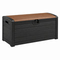 Coffre de rangement extérieur Qaldrion en résine noir/marron avec couvercle effet bois, dimensions 145 x 75 x 65 cm.