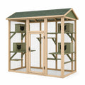 Enclos extérieur pour chat Qaldrion, bois naturel et vert, avec grillage et abris surélevés, dimensions 180x90x180 cm
